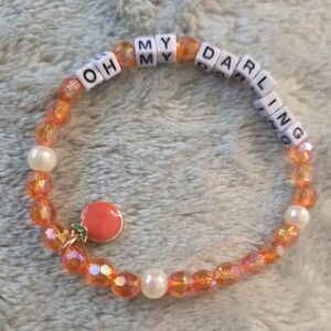 Orange Beaded Bracelet with Charm